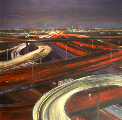 As the evening starts to descend on a January rush-hour in Los Angeles, the freeways are all aglow in white and red